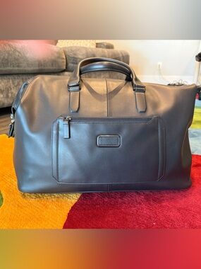 Tumi Black Leather Duffel Travel Bag - Harrison 
New, never been used!